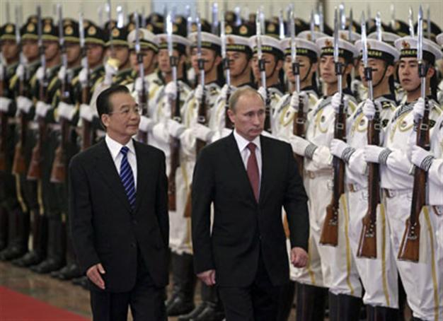 Russian PM Putin in China seeking closer ties