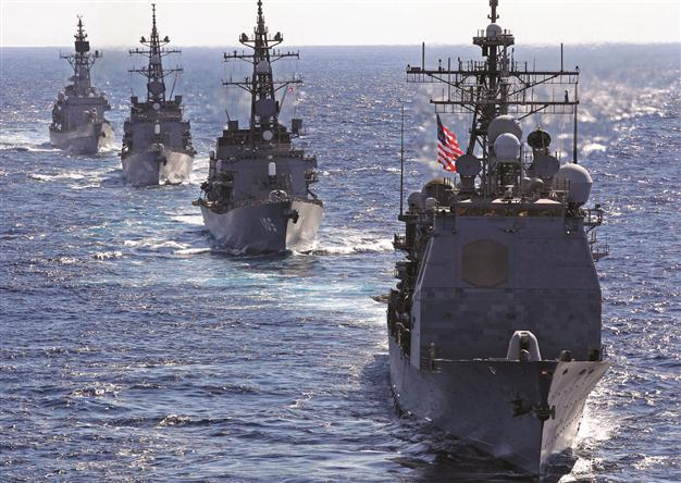 US flexes muscles at Beijing