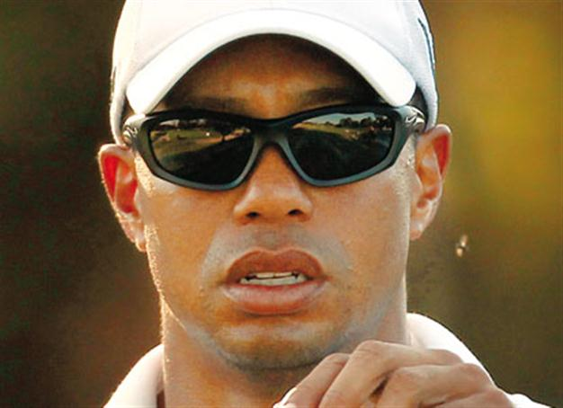 Revitalized Woods back in the hunt for trophy in Australia