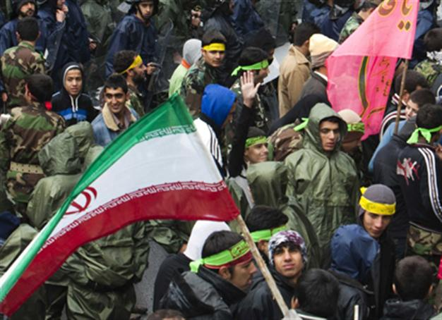 Iran protesters enter British embassy compound, remove flag