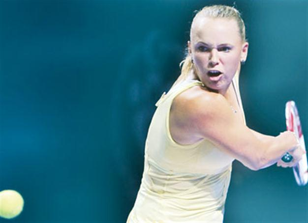 Wozniacki secures No 1 ranking as Sharapova pulls put