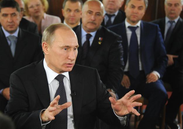 Putin says to reshuffle govt after presidential vote