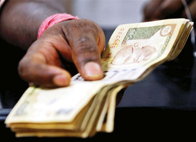 Rupee hits all-time low against dollar with slowdown in Indian economy