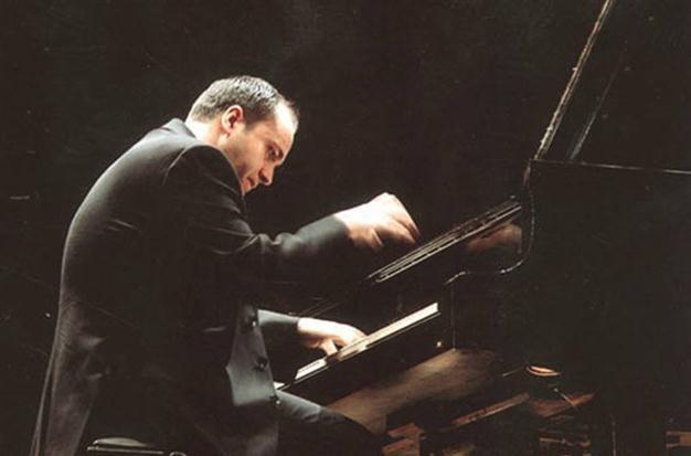 Jerfi Aji onstage for piano concert at Akbank Art