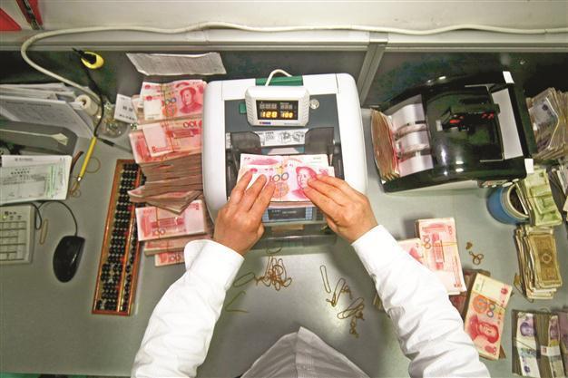 China to widen yuan trading band gradually