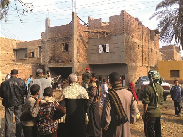 Egypt Muslims, Christians clash over prophet cartoon