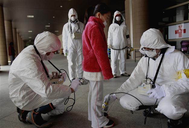 Japan releases 40-year nuke plant cleanup plan