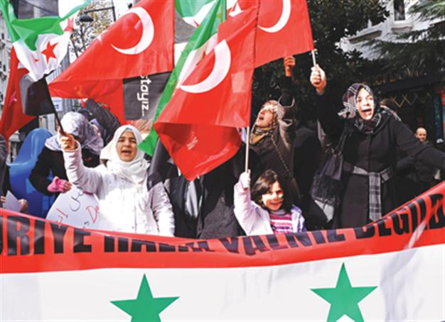 Turkey, France call for int’l pressure on Assad