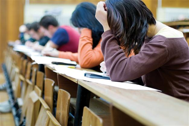 Coefficients in Turkish university exam lifted