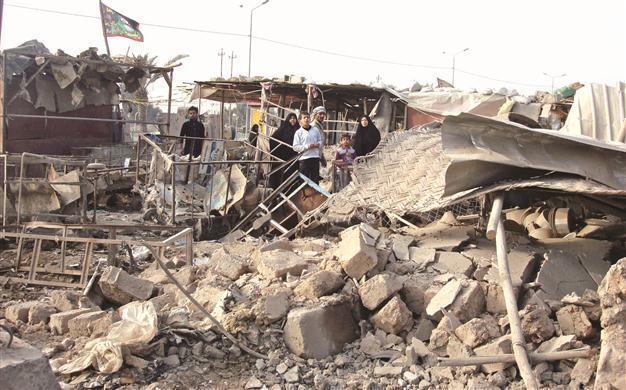 Iraq blasts kill 60 as tension escalades
