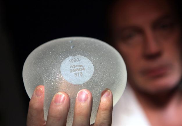 France urges removal of breast implants