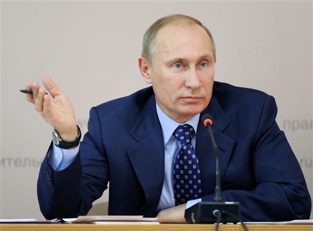 Putin team defiant after protest rocks Russia
