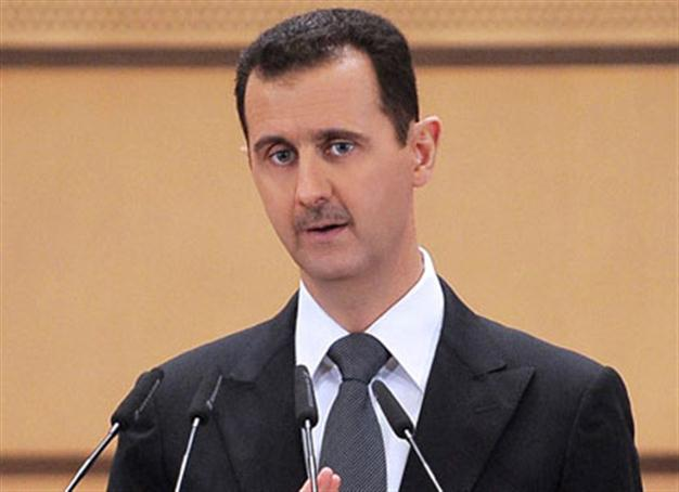 Assad vows no exit