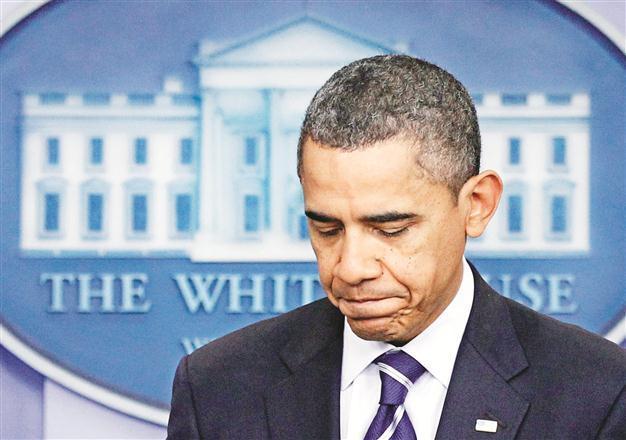 Barack Obama signs bill for $1 trillion of spending