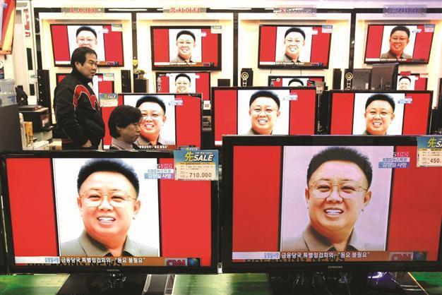 Asia shares slip on N Korean leaders’ death, eurozone fears