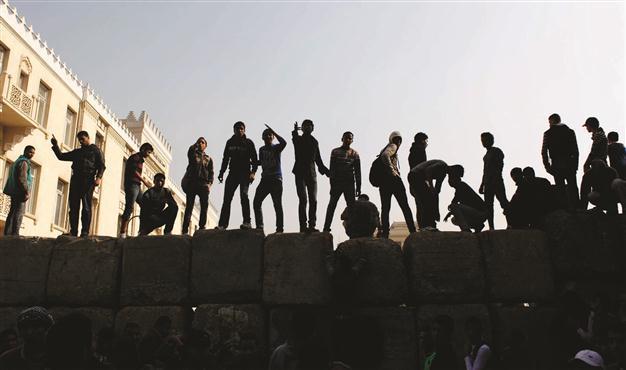 Egyptian activists react to army’s dire crackdown