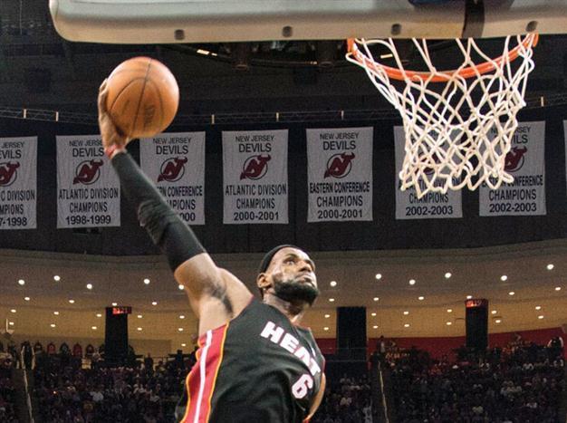 LeBron returns, Heat cruise past New Jersey