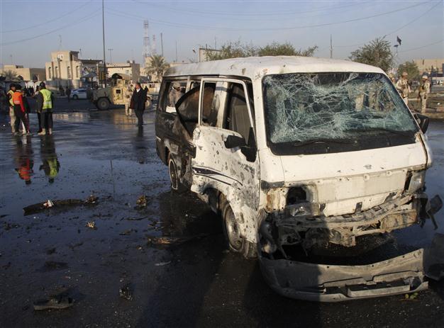 Officials: Car bombs kill 14 across Baghdad