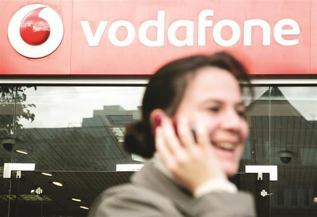 Vodafone weighing bid for C&W