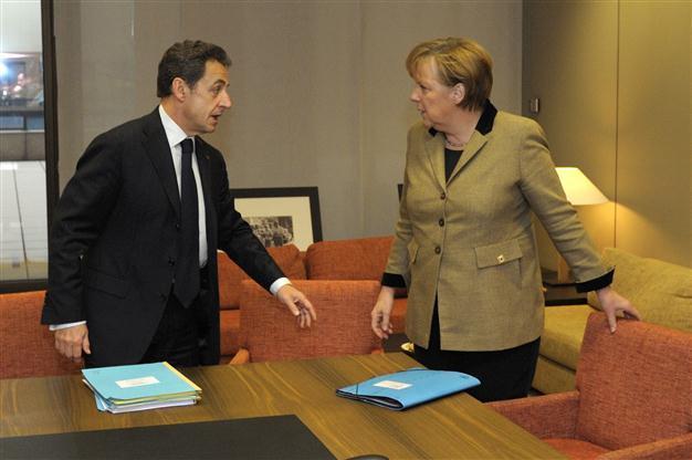 Merkel election support for Sarkozy shows worries of both