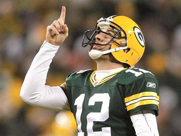 Packers get one over fierce rivals to clinch top seed in NFL