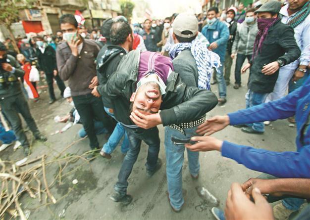 Deadly Egypt rallies follow violence on football pitch