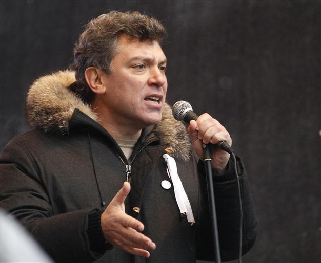 Putin critic plays down Misha for president badge