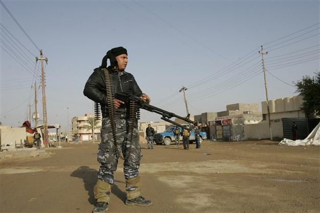Wave of attacks as gunmen storm Iraq police station