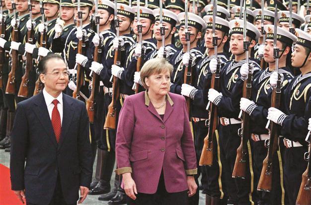 Merkel pushes China on Iran