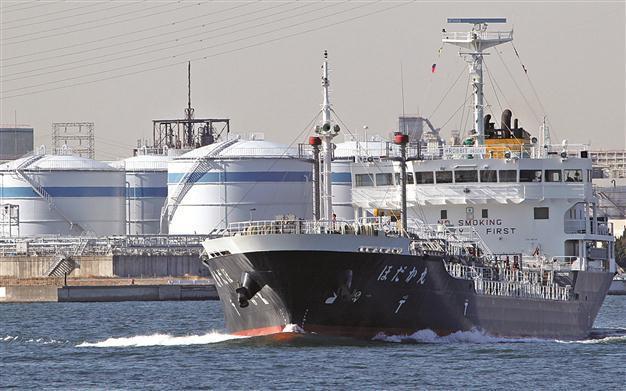 Japan logs record trade deficit on power shortages, high yen