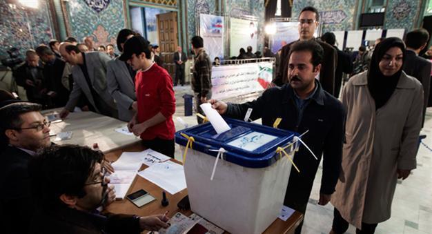 Iran touts high turnout, Ahmadinejad faction losing