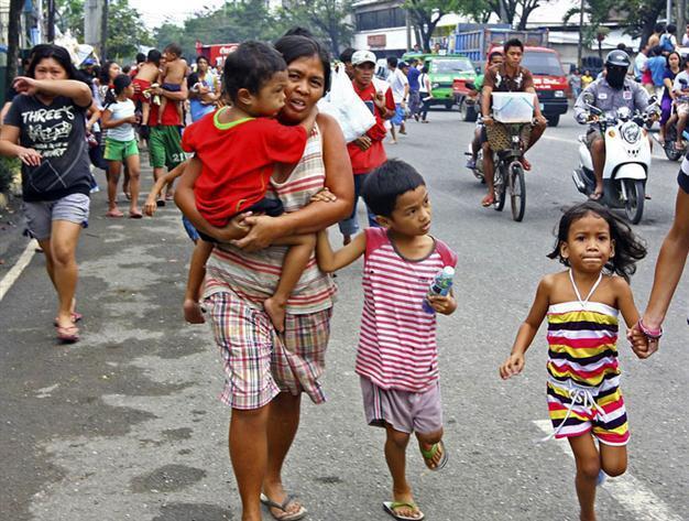 Philippine rescuers search for quake survivors