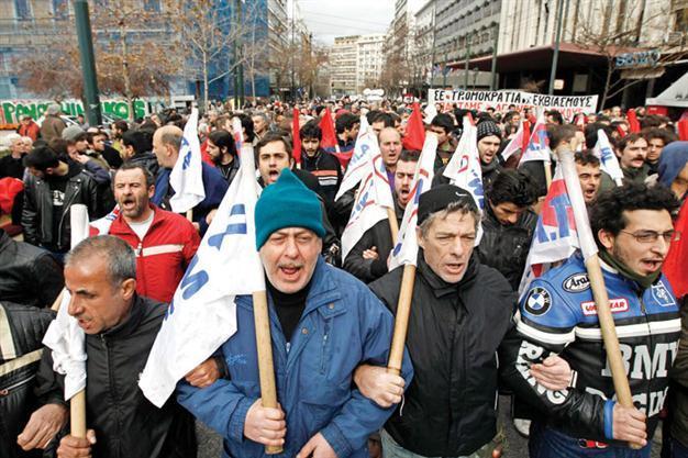 Large Greek trade unions walk off as EU pressure increases