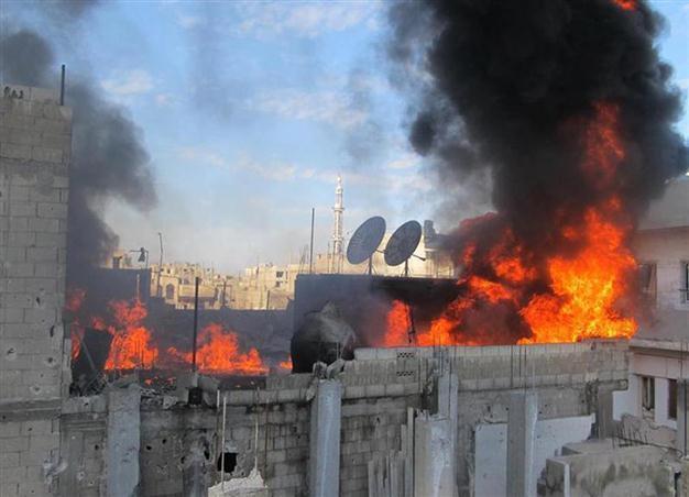 Syria to try to evacuate journalists from Homs