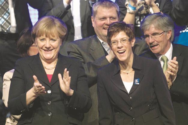 State poll offers boost for Merkel but crushes allies