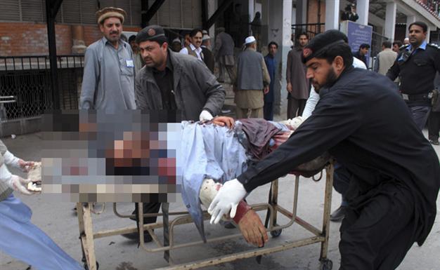 Suicide bombing kills 13, wounds 30 in Pakistan