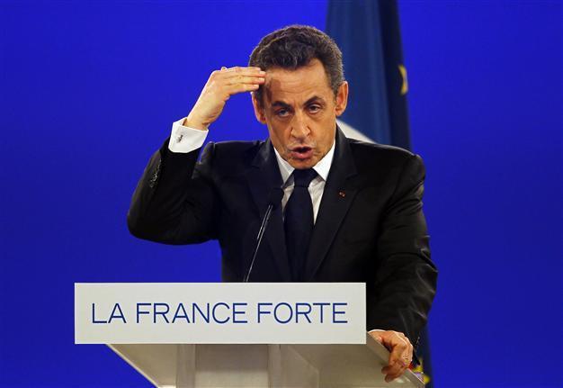Germany defends Europe visa-free zone after Sarkozy threat