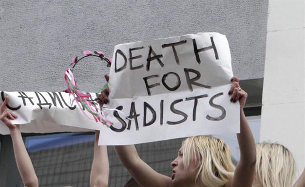 High-profile Ukraine men accused of raping, burning woman alive