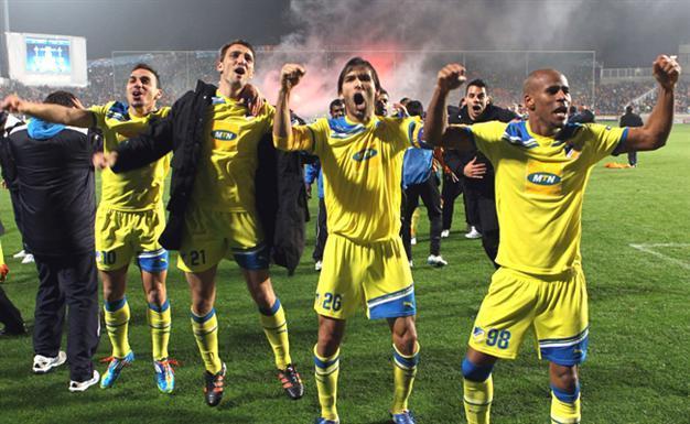 History-making APOEL beats Lyon to reach last eight