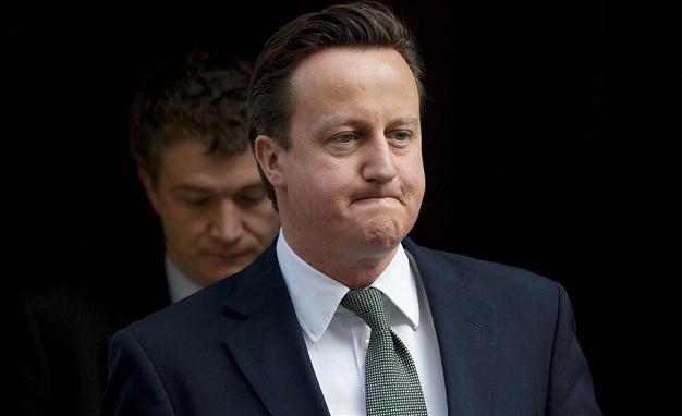 Britain budget to drive down deficit, cut income tax
