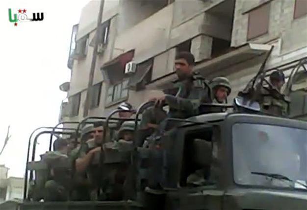 Syria wants guarantees to pull troops from cities