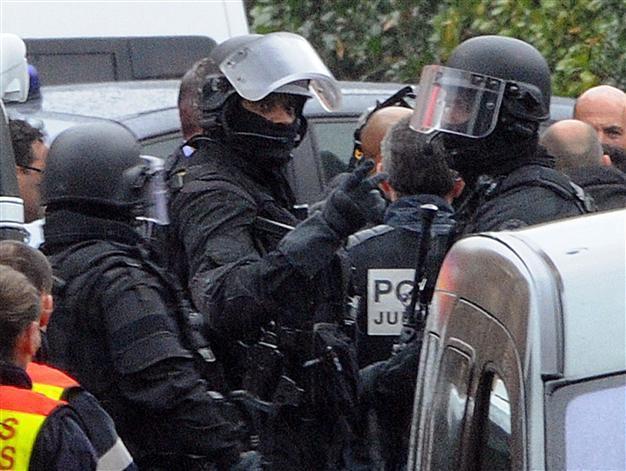 France suspect died after jumping out window: minister