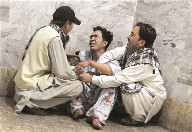 Suicide bombers kill over 20 in Afghanistan