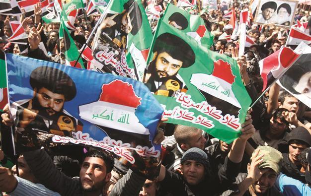 Sadr supporters stage rally on Iraq war anniversary
