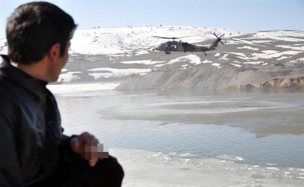 Body of worker found in lake as search goes on in eastern Turkey