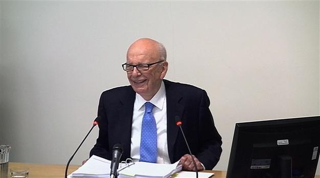 Murdoch denies seeking favours from UK leaders