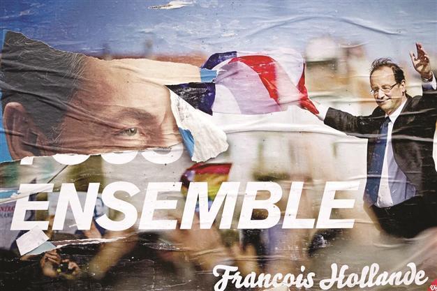 Hollande looks for votes of immigrants
