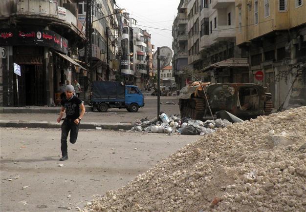 23 troops killed, EU slaps new sanctions on Syria
