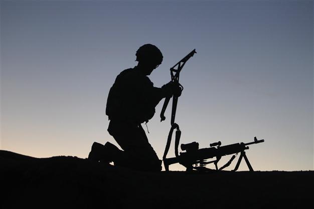 US troops posed with Afghan body parts: report