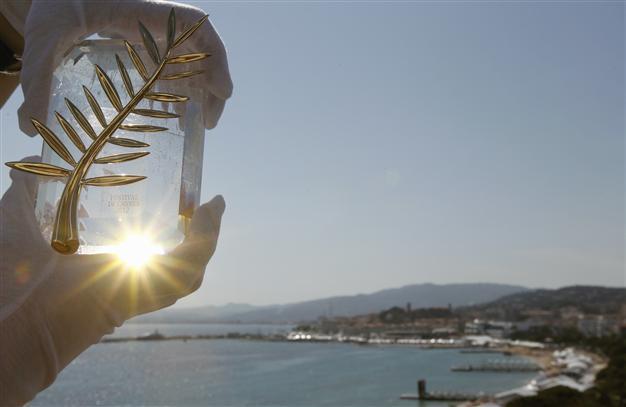 Cannes curtain goes up with whimsy, glamour